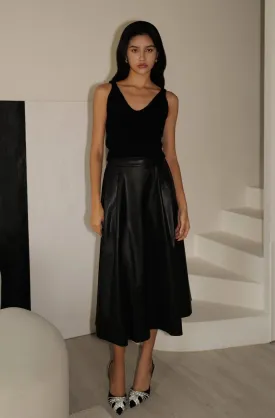 Level up the look faux leather skirt with belt